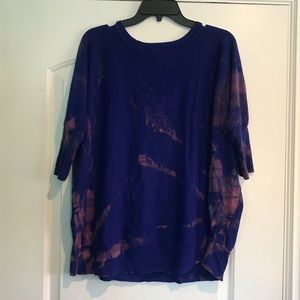 Reverse tie dye blue sweater shirt.